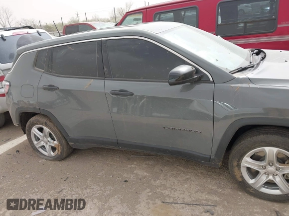 2023 Jeep Compass Sport with VIN 3C4NJDAN0PT572381, listed as a IAAI auction lot 41790372 with 28,827 mi miles and . Bid and sale history available at DreamBid. Image 14.