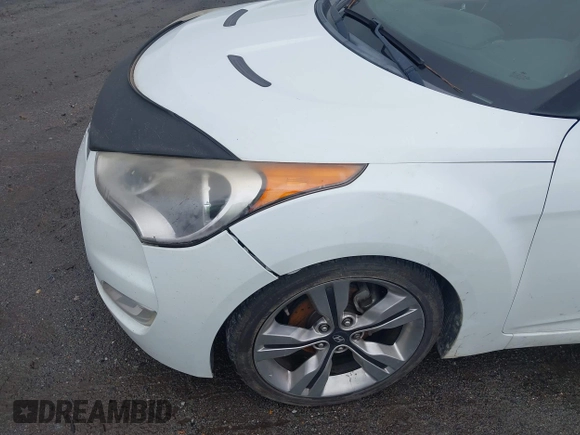 2012 Hyundai Veloster w/Gray Int с VIN KMHTC6ADXCU074298, выставлен на аукционе IAAI как лот 42353923 с пробегом 129 114 миль миль и . История ставок и продаж доступна на DreamBid. Изображение 6.