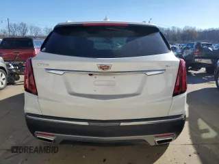 2021 Cadillac XT5 FWD Premium Luxury with VIN 1GYKNCRS0MZ198199, listed as a Copart auction lot 83595494 with 27,923 mi miles and Salvage Title. Bid and sale history available at carsss.com. Image 6.