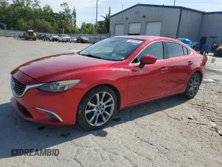 2016 Mazda 6 i Grand Touring with VIN JM1GJ1W5XG1474840, listed as a Copart auction lot 54019355 with 129,760 mi miles and Salvage Title. Bid and sale history available at DreamBid. Image 1.