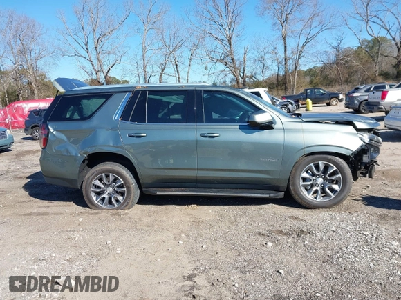 2023 Chevrolet Tahoe LS with VIN 1GNSCMKD5PR444303, listed as a IAAI auction lot 41260372 with 13,180 mi miles and . Bid and sale history available at DreamBid. Image 14.
