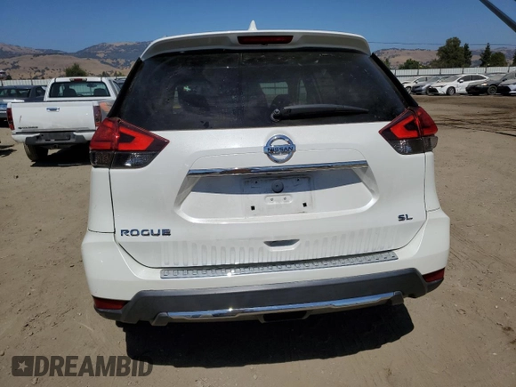 2017 Nissan Rogue SL with VIN 5N1AT2MT3HC751952, listed as a Copart auction lot 60842915 with 75,606 mi miles and Salvage title. Bid and sale history available at DreamBid. Image 6.