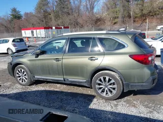 2019 Subaru Outback Touring with VIN 4S4BSATC7K3272301, listed as a IAAI auction lot 41318172 with 102,417 mi miles and . Bid and sale history available at DreamBid. Image 14.