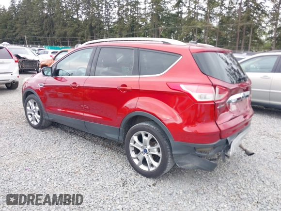 2014 Ford Escape Titanium with VIN 1FMCU9J9XEUD71715, listed as a IAAI auction lot 42127982 with 96,549 mi miles and . Bid and sale history available at DreamBid. Image 3.