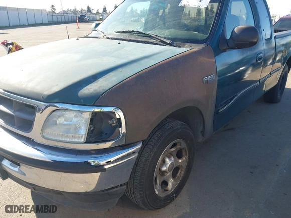 1997 Ford F-150 Standard with VIN 1FTDX1764VKB21915, listed as a IAAI auction lot 41435117 with 147,635 mi miles. Bid and sale history available at carsss.com. Image 6.