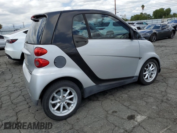 2009 Smart fortwo Pure with VIN WMEEJ31X89K251402, listed as a Copart auction lot 56791545 with 52,636 mi miles and Clean title. Bid and sale history available at DreamBid. Image 3.