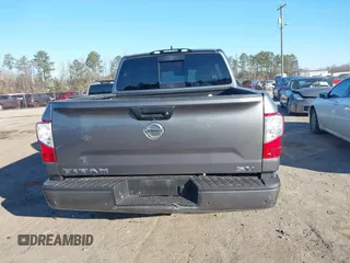 2022 Nissan Titan SV with VIN 1N6AA1EE3NN104176, listed as a IAAI auction lot 41159789 with 53,991 mi miles and . Bid and sale history available at DreamBid. Image 16.