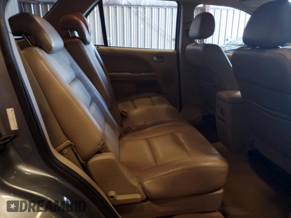 2007 Ford Freestyle SEL z VIN 1FMDK05177GA01690, wystawiony jako Copart lot #46408135 z przebiegiem 197 396 mil mil oraz Nie do naprawy • Non repairable. Historia ofert i sprzedaży dostępna na DreamBid. Obrazek 11.