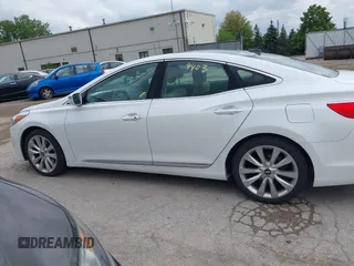 2016 Hyundai Azera Limited z VIN KMHFH4JG6GA547389, wystawiony jako IAAI lot #42374403 z przebiegiem 164 843 mil mil oraz . Historia ofert i sprzedaży dostępna na DreamBid. Obrazek 14.
