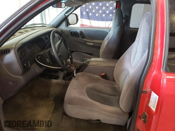 1999 Dodge Dakota SLT with VIN 1B7GG22YXXS215599, listed as a Copart auction lot 54630655 with 141,255 mi miles and Clean Title. Bid and sale history available at DreamBid. Image 7.