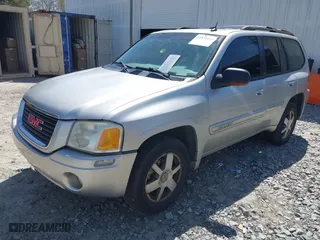 2005 GMC Envoy SLE with VIN 1GKDS13S652390259, listed as a IAAI auction lot 41825258 with 162,172 mi miles. Bid and sale history available at carsss.com. Image 2.