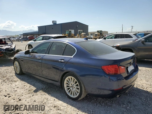 2013 BMW 5 Series 535i xDrive with VIN WBAFU7C52DDU76017, listed as a Copart auction lot 57461795 with 160,417 mi miles and Salvage title. Bid and sale history available at DreamBid. Image 2.