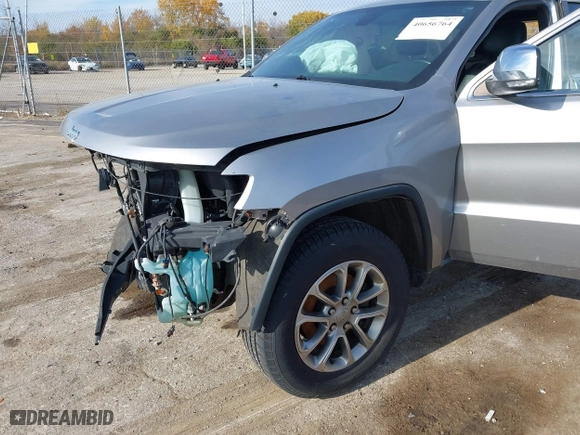 2014 Jeep Grand Cherokee Limited with VIN 1C4RJFBG4EC579551, listed as a IAAI auction lot 40656764 with 132,080 mi miles. Bid and sale history available at carsss.com. Image 6.