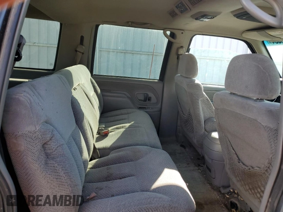 1999 Chevrolet Suburban with VIN 1GNFK16R4XJ483035, listed as a Copart auction lot 76666034 with 215,048 mi miles and Clean Title. Bid and sale history available at carsss.com. Image 11.