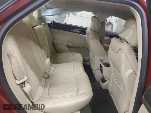 2015 Lincoln MKZ z VIN 3LN6L2J92FR624638, wystawiony jako Copart lot #57158245 z przebiegiem 150 045 mil mil oraz Szkoda całkowita • Salvage title. Historia ofert i sprzedaży dostępna na DreamBid. Obrazek 10.