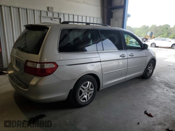 2007 Honda Odyssey EX with VIN 5FNRL38477B429624, listed as a Copart auction lot 53961825 with 144,957 mi miles and Salvage Title. Bid and sale history available at DreamBid. Image 3.