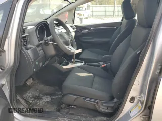 2019 Honda Fit LX z VIN 3HGGK5H41KM712693, wystawiony jako Copart lot #52069275 z przebiegiem 68 522 mil mil oraz Szkoda całkowita • Salvage title. Historia ofert i sprzedaży dostępna na DreamBid. Obrazek 7.