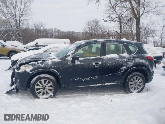 2016 Mazda CX-5 Sport z VIN JM3KE4BY0G0919017, wystawiony jako IAAI lot #41316161 z przebiegiem 209 259 mil mil oraz . Historia ofert i sprzedaży dostępna na DreamBid. Obrazek 14.