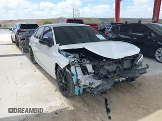 2022 Honda Civic Sport z VIN 2HGFE2F5XNH538882, wystawiony jako IAAI lot #42171377 z przebiegiem 76 932 mil mil oraz . Historia ofert i sprzedaży dostępna na DreamBid. Obrazek 1.