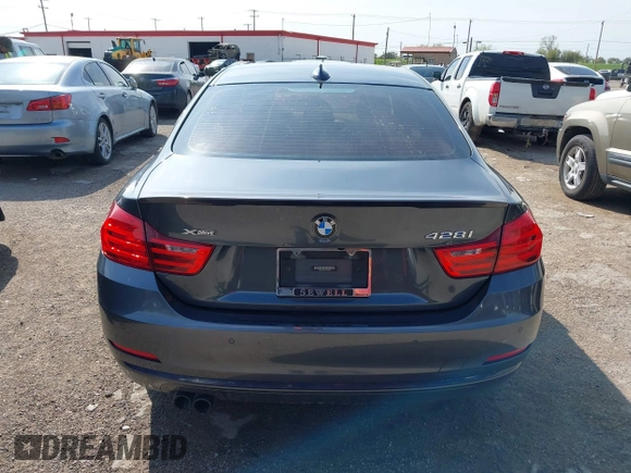 2015 BMW 4 Series 428i xDrive z VIN WBA3N5C55FK484938, wystawiony jako IAAI lot #41889907 z przebiegiem 100 439 mil mil oraz . Historia ofert i sprzedaży dostępna na DreamBid. Obrazek 16.