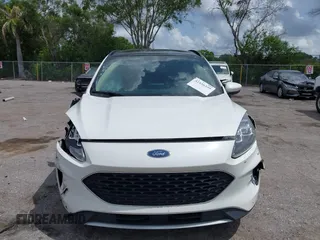 2020 Ford Escape Titanium Hybrid with VIN 1FMCU0DZ3LUC07842, listed as a IAAI auction lot 42456359 with 62,756 mi miles and . Bid and sale history available at DreamBid. Image 13.