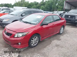 2010 Toyota Corolla with VIN 1NXBU4EE5AZ291903, listed as a IAAI auction lot 42143469 with 123,747 mi miles and . Bid and sale history available at DreamBid. Image 2.