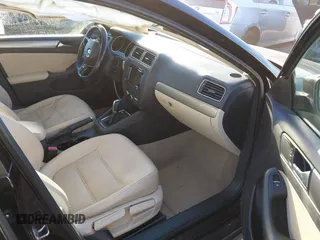 2015 Volkswagen Jetta Sedan 1.8T SE with VIN 3VWD17AJ3FM407697, listed as a IAAI auction lot 40659086 with 107,834 mi miles. Bid and sale history available at carsss.com. Image 5.