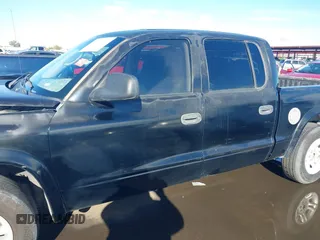 2003 Dodge Dakota Sport with VIN 1D7HL38X53S381338, listed as a IAAI auction lot 38840426 with 130,846 mi miles. Bid and sale history available at carsss.com. Image 14.