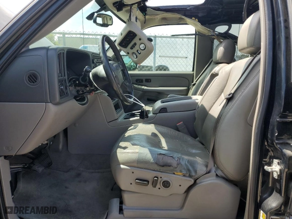 2005 Chevrolet Tahoe LT with VIN 1GNEC13T95J243128, listed as a Copart auction lot 53058245 with 142,075 mi miles and Salvage Title. Bid and sale history available at carsss.com. Image 7.