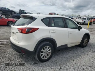 2016 Mazda CX-5 Sport with VIN JM3KE2BYXG0640842, listed as a Copart auction lot 54017605 with 197,504 mi miles and Clean Title. Bid and sale history available at carsss.com. Image 3.