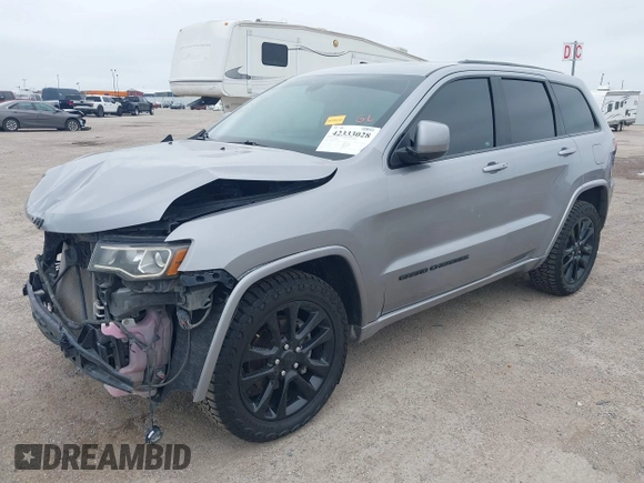2019 Jeep Grand Cherokee Laredo E with VIN 1C4RJFAG9KC670974, listed as a IAAI auction lot 42333028 with 163,958 mi miles and . Bid and sale history available at DreamBid. Image 2.