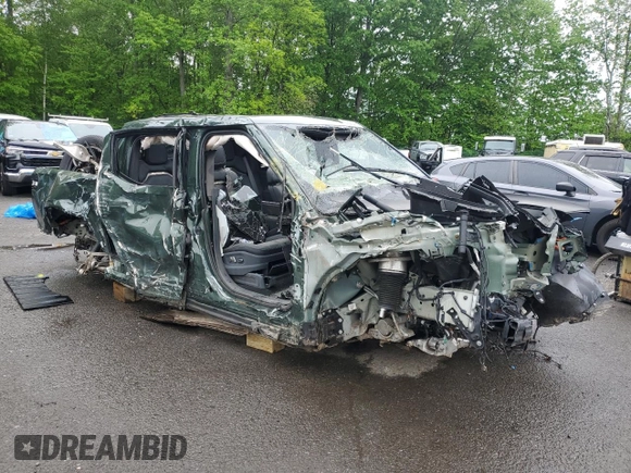 2023 Rivian R1T Adventure z VIN 7FCTGAAA5PN019737, wystawiony jako Copart lot #57290475 z przebiegiem Nie podano mil oraz Nie do naprawy. Historia ofert i sprzedaży dostępna na DreamBid. Obrazek 4.