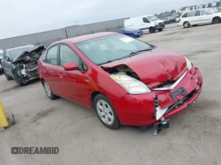 2007 Toyota Prius z VIN JTDKB20U673288178, wystawiony jako IAAI lot #42362578 z przebiegiem 104 388 mil mil oraz . Historia ofert i sprzedaży dostępna na DreamBid. Obrazek 1.