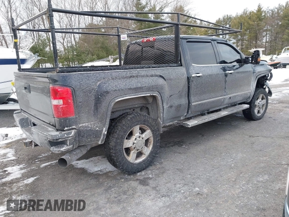 2016 GMC Sierra 2500HD Denali z VIN 1GT12UE81GF128498, wystawiony jako IAAI lot #41346398 z przebiegiem 164 532 mil mil oraz . Historia ofert i sprzedaży dostępna na DreamBid. Obrazek 4.