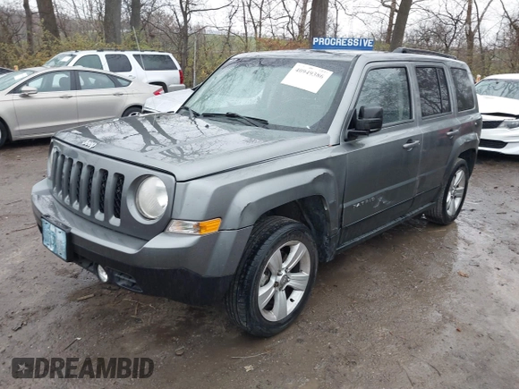 2013 Jeep Patriot Latitude with VIN 1C4NJPFB8DD129848, listed as a IAAI auction lot 40949386 with 168,839 mi miles and . Bid and sale history available at carsss.com. Image 2.