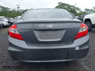 2012 Honda Civic Sdn LX with VIN 2HGFB2F55CH322220, listed as a IAAI auction lot 41702440 with 144,027 mi miles. Bid and sale history available at carsss.com. Image 16.