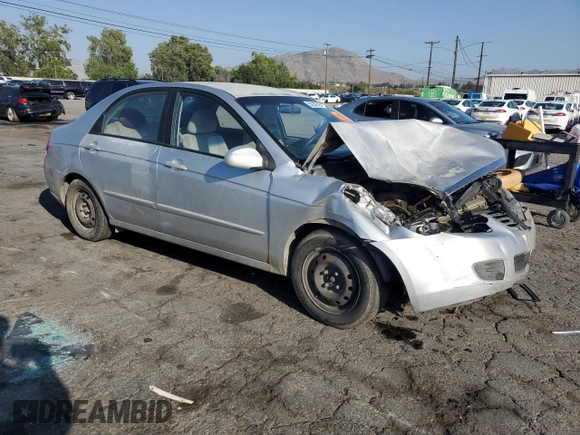 2008 Kia Spectra EX with VIN KNAFE122485540611, listed as a Copart auction lot 56258515 with 197,475 mi miles and Salvage title. Bid and sale history available at DreamBid. Image 4.