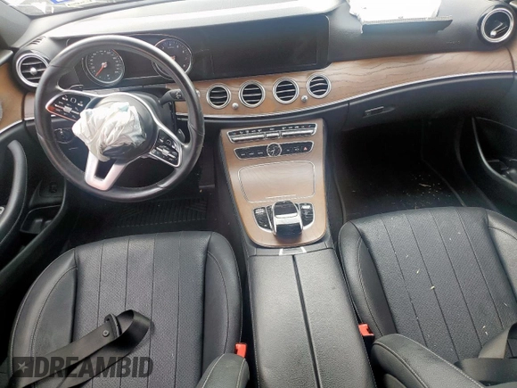 2019 Mercedes-Benz E 300 with VIN WDDZF4JB2KA618999, listed as a Copart auction lot 56915465 with 64,077 mi miles and Salvage title. Bid and sale history available at DreamBid. Image 8.