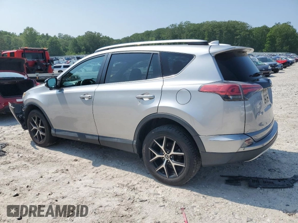 2016 Toyota RAV4 SE with VIN 2T3JFREV4GW531364, listed as a Copart auction lot 60031585 with 147,741 mi miles and Salvage title. Bid and sale history available at DreamBid. Image 2.