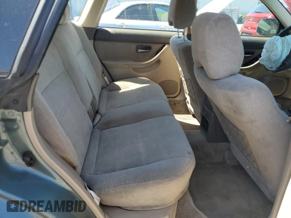 2002 Subaru Legacy Outback with VIN 4S3BH665427633764, listed as a Copart auction lot 57443145 with 210,616 mi miles and Salvage title. Bid and sale history available at DreamBid. Image 10.