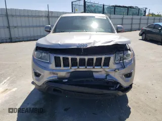 2016 Jeep Grand Cherokee Laredo with VIN 1C4RJEAGXGC358910, listed as a Copart auction lot 61499455 with 86,054 mi miles and Salvage title. Bid and sale history available at DreamBid. Image 5.