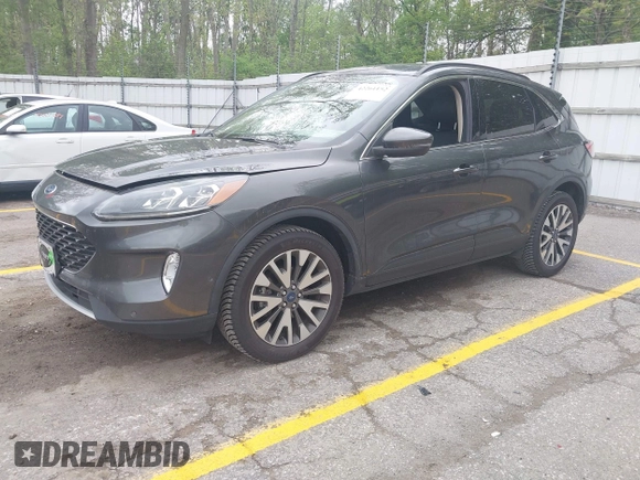 2020 Ford Escape Titanium with VIN 1FMCU9J96LUA00564, listed as a IAAI auction lot 42261152 with 73,748 mi miles and . Bid and sale history available at DreamBid. Image 19.