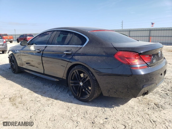 2013 BMW 6 Series 640i with VIN WBA6A0C52DDZ03809, listed as a Copart auction lot 84518974 with 84,147 mi miles and Salvage Title. Bid and sale history available at carsss.com. Image 2.