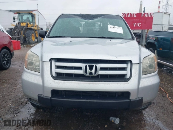 2007 Honda Pilot LX with VIN 2HKYF18157H530370, listed as a IAAI auction lot 41967033 with 214,590 mi miles and . Bid and sale history available at DreamBid. Image 12.