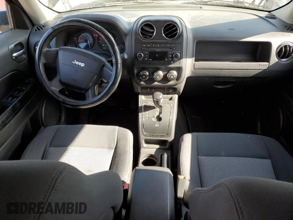 2010 Jeep Patriot Sport with VIN 1J4NF2GB8AD519311, listed as a Copart auction lot 53799085 with 203,762 mi miles and Salvage Title. Bid and sale history available at carsss.com. Image 8.