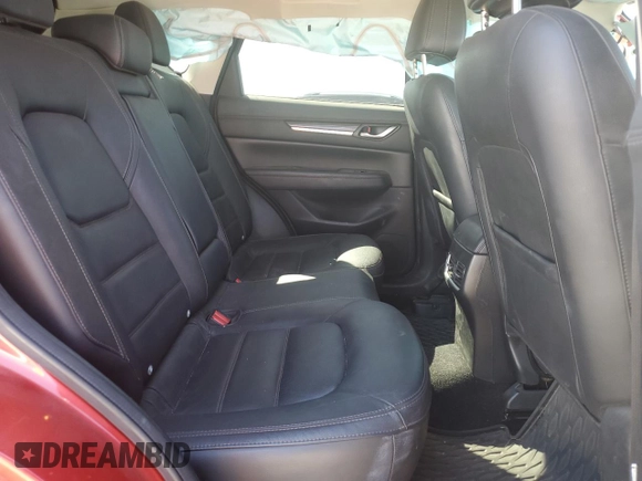 2017 Mazda CX-5 Grand Touring with VIN JM3KFBDL0H0118057, listed as a Copart auction lot 50121335 with 148,275 mi miles and Salvage Title. Bid and sale history available at carsss.com. Image 11.