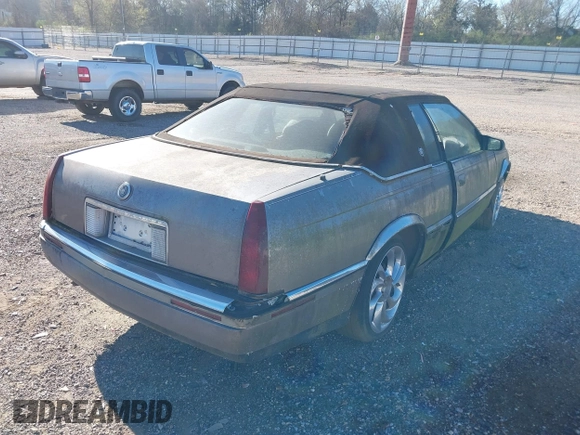 1992 Cadillac Seville z VIN 1G6EL13B2N0612154, wystawiony jako IAAI lot #41757101 z przebiegiem Nie podano mil oraz . Historia ofert i sprzedaży dostępna na DreamBid. Obrazek 4.