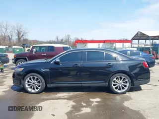 2014 Ford Taurus Limited with VIN 1FAHP2F80EG104984, listed as a IAAI auction lot 41910463 with 174,034 mi miles. Bid and sale history available at carsss.com. Image 14.