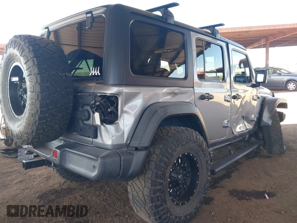 2019 Jeep Wrangler Unlimited Sport S z VIN 1C4HJXDG7KW557682, wystawiony jako IAAI lot #42586742 z przebiegiem 49 741 mil mil oraz . Historia ofert i sprzedaży dostępna na DreamBid. Obrazek 4.