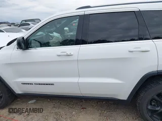 2018 Jeep Grand Cherokee Laredo E with VIN 1C4RJEAG7JC322888, listed as a IAAI auction lot 41756833 with 129,988 mi miles and . Bid and sale history available at DreamBid. Image 14.